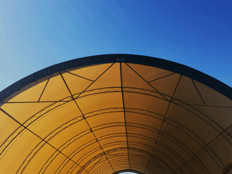 How Hail Protection Structures Help Dealerships Navigate New Hail Insurance Rules